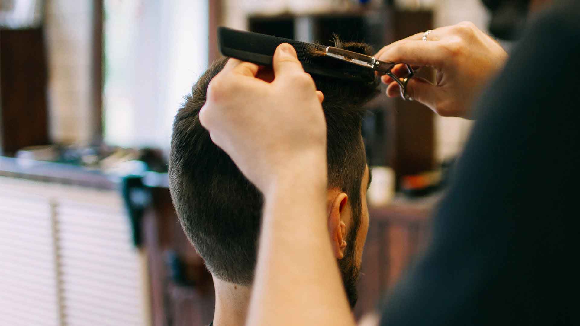 Barber working at NATAN BARBER SHOP